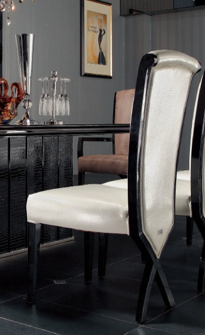 Two 43.5' White Leatherette and Black Wood Dining Chairs with X Shaped Rear Legs