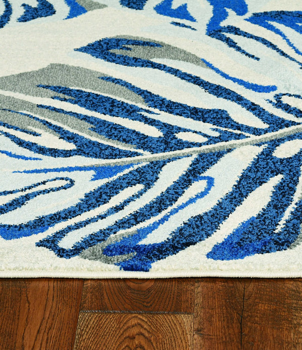 10'x13' Grey Blue Machine Woven Tropical Leaves Indoor Area Rug