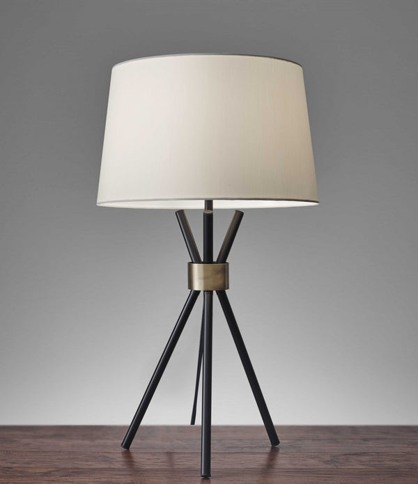 Black Metal Tripod Leg with Antique Brass Accent Table Lamp