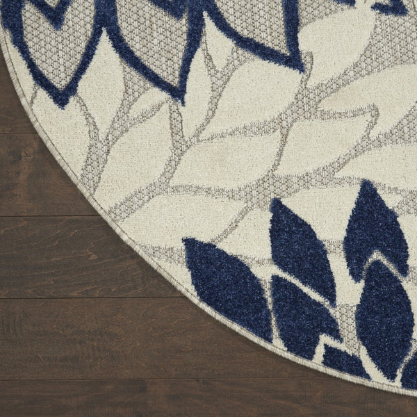 8’ Round Ivory and Navy Indoor Outdoor Area Rug