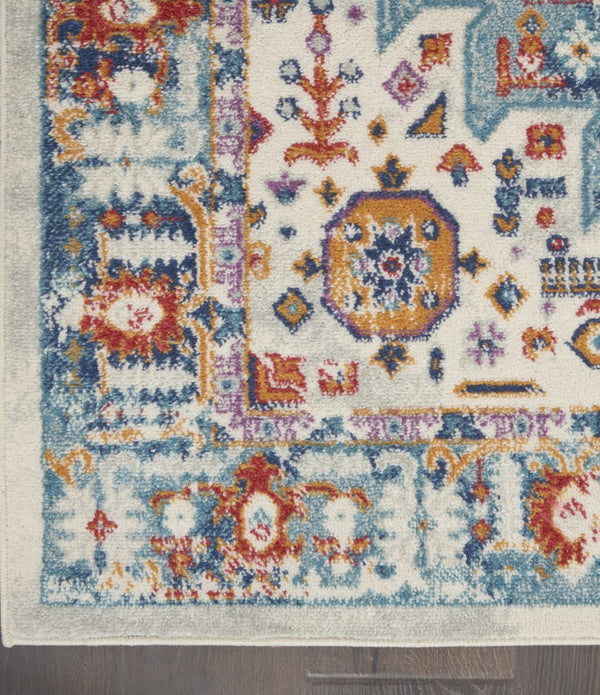 8’ x 10’ Ivory and Blue Floral Motifs Area Rug