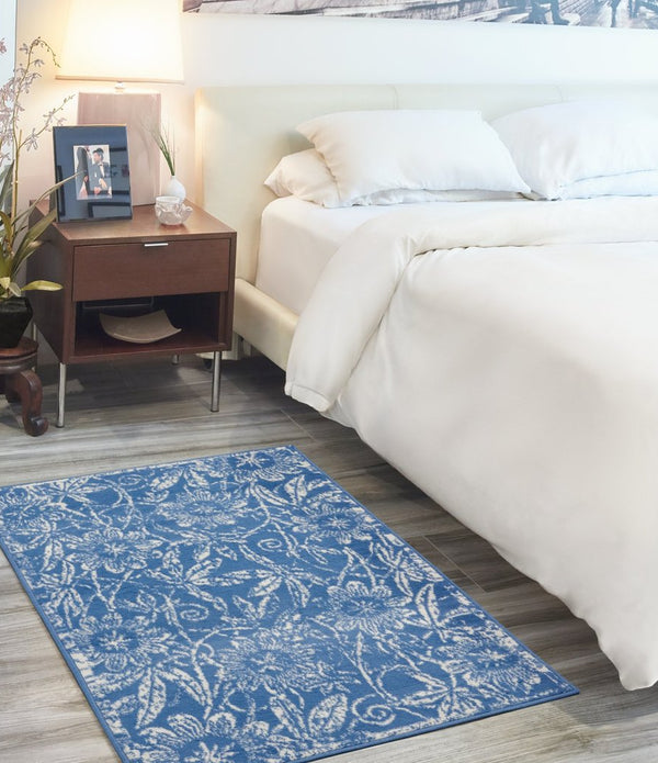 5’ x 7’ Blue and Ivory Floral Vines Area Rug