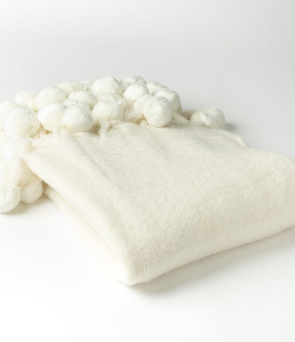 Plush White Wool Blend Throw With Pom Pom Trim Detail