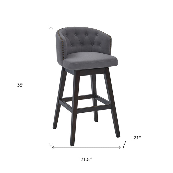 26" Grey Tufted Fabric and Dark Espresso Wood Swivel Bar Stool